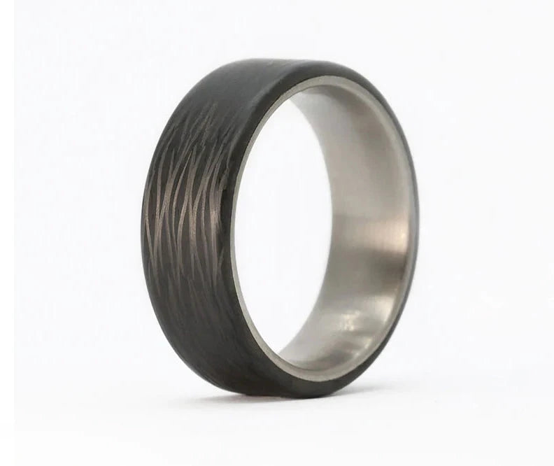 carbon fiber ring with titanium sleeve