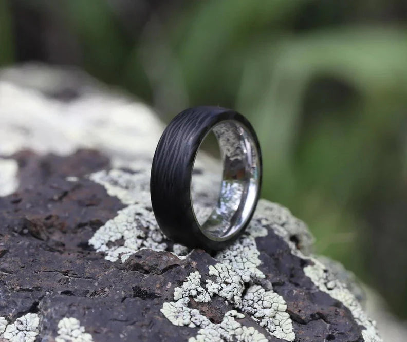 carbon fiber ring with titanium sleeve