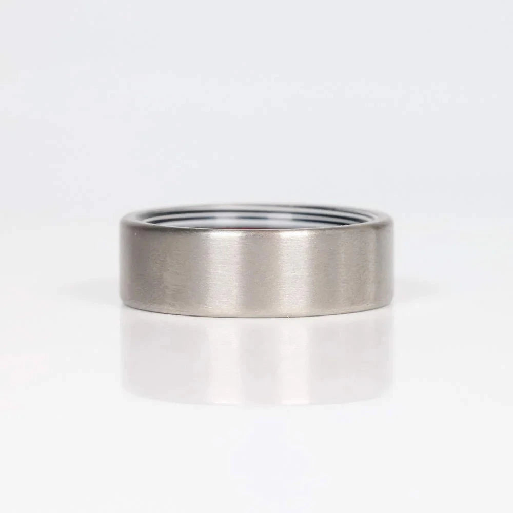 Fordite Ring with Titanium Exterior 
