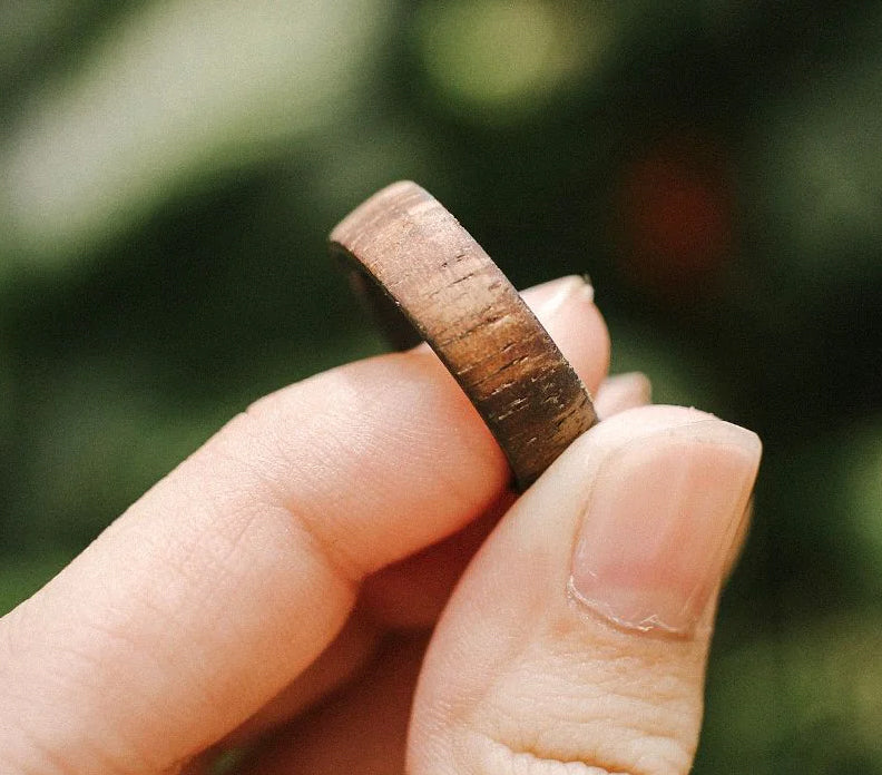 Koa Wood Ring with Carbon Fiber Sleeve Nature Shot