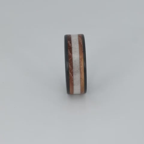 antler ring with whiskey barrel and carbon fiber