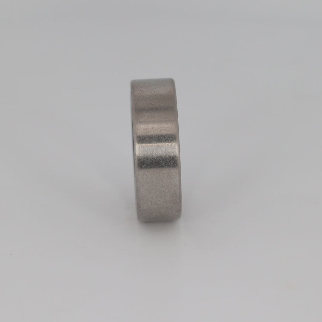 Fordite Ring with Titanium Exterior