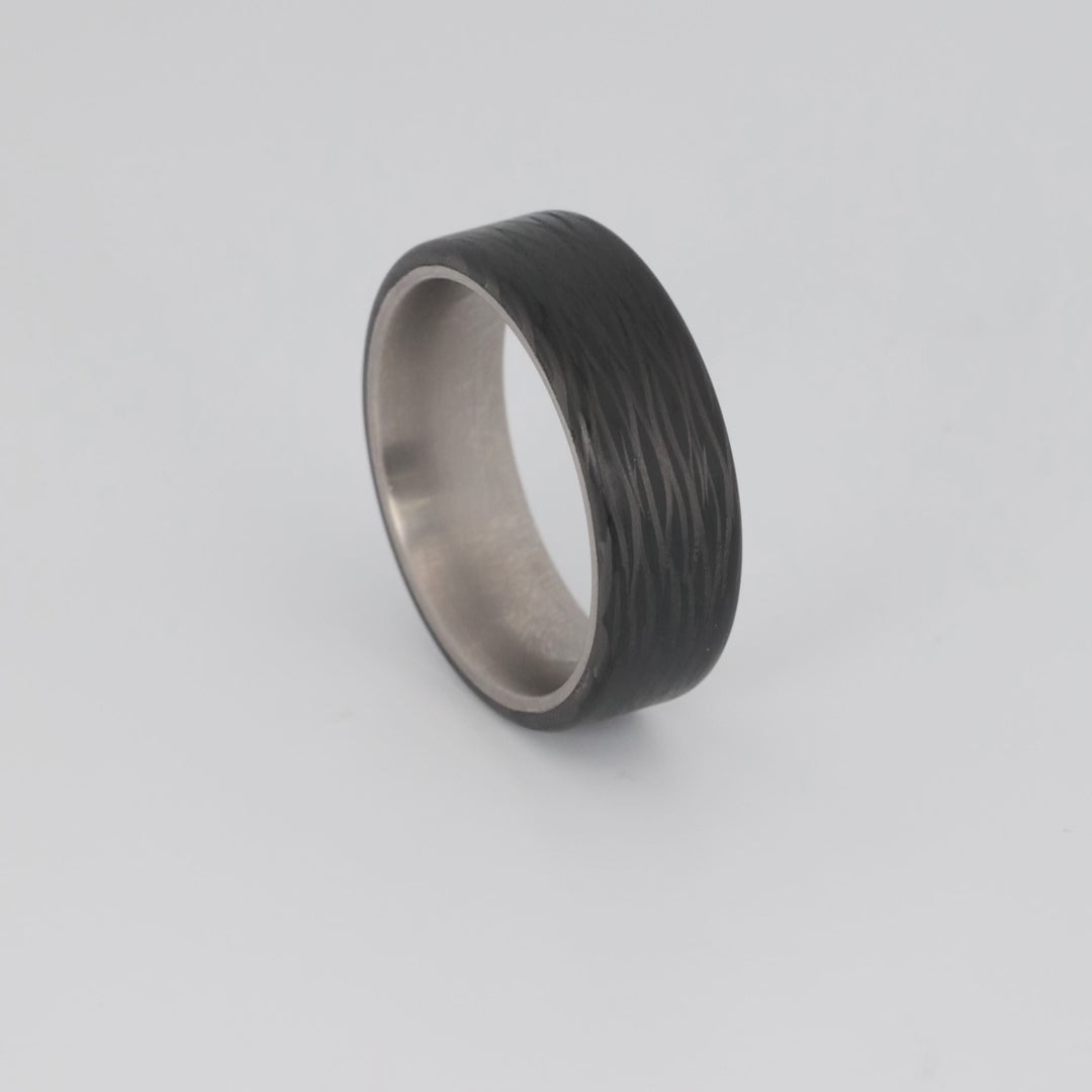 Video carbon fiber ring with titanium sleeve