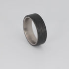 Video carbon fiber ring with titanium sleeve